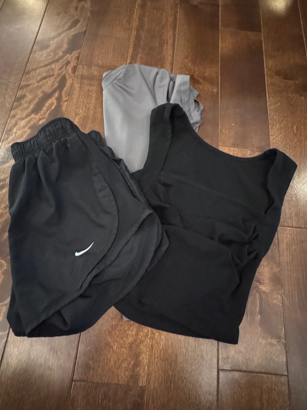 Nike size small shorts with  Black Tank Top and Grey Tshirt